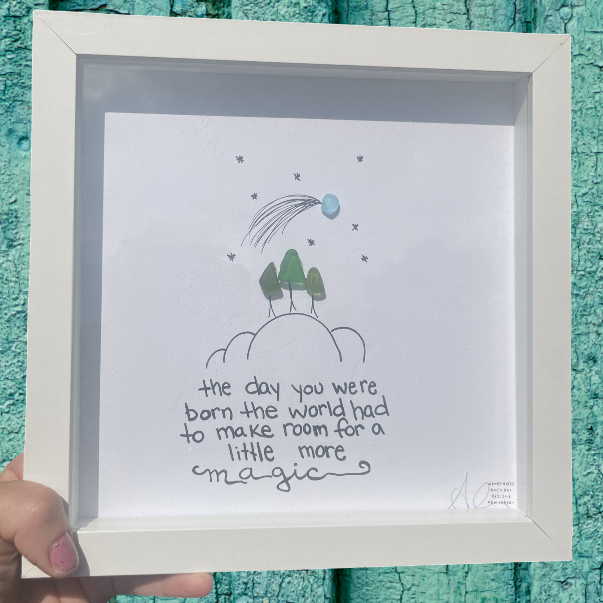 Framed print with a quote and illustration the day you were born the world had to make room for a little more magic sea glass art