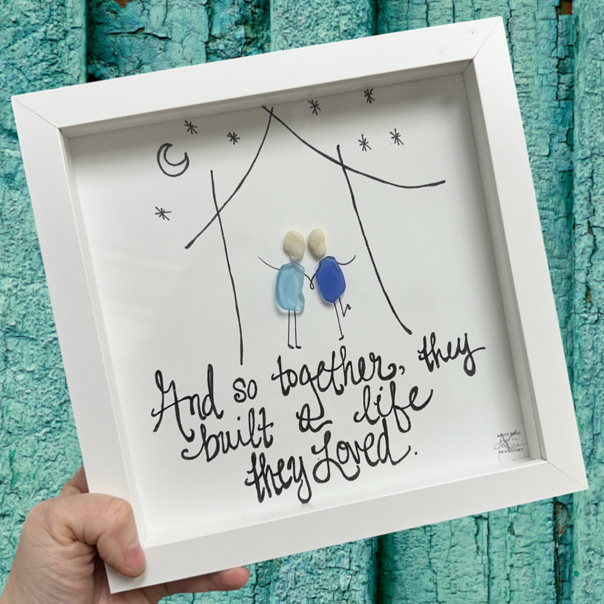Framed artwork with text and so together they built a life they loved