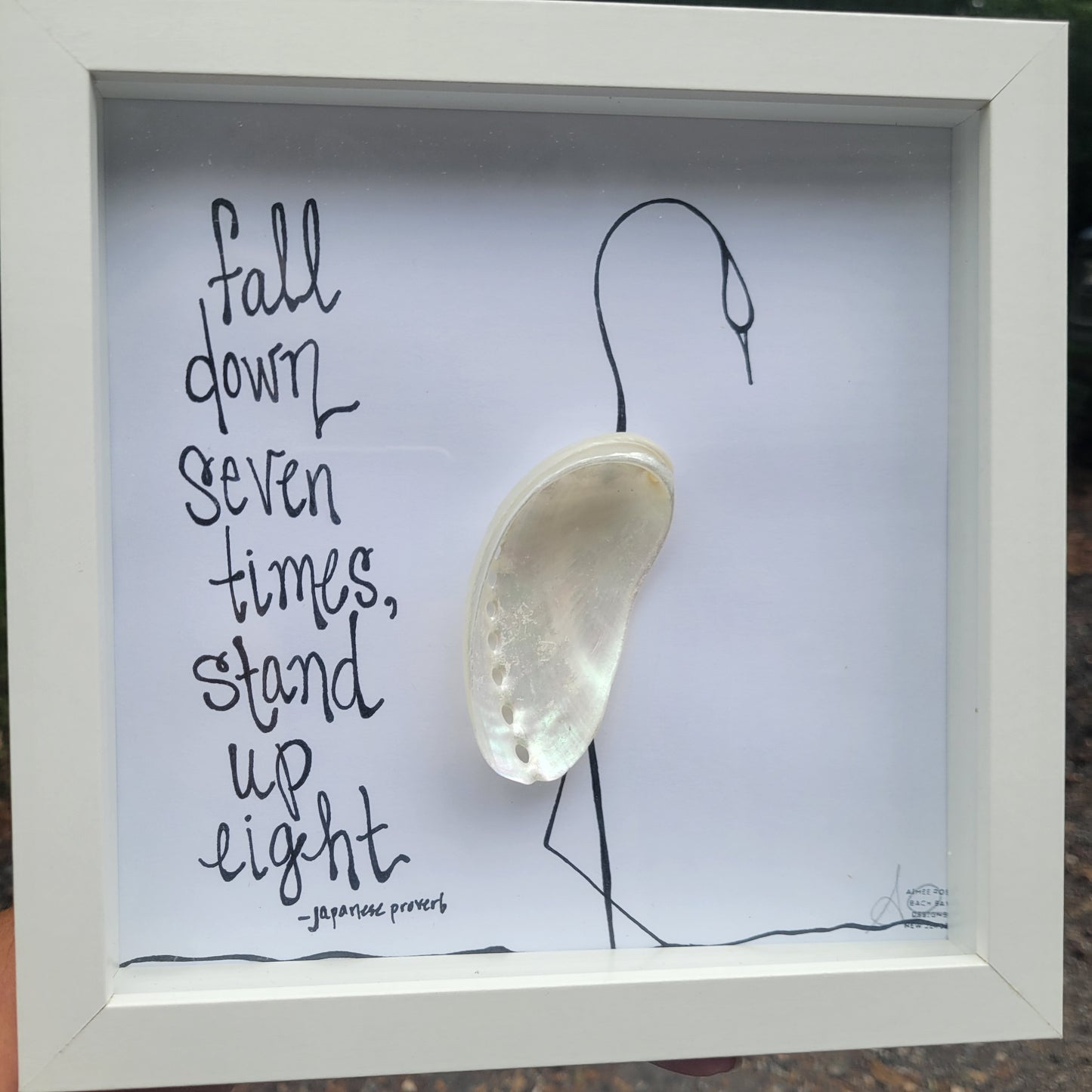Image: White Egret with shell for body Quote: "Fall down seven times, stand up eight"