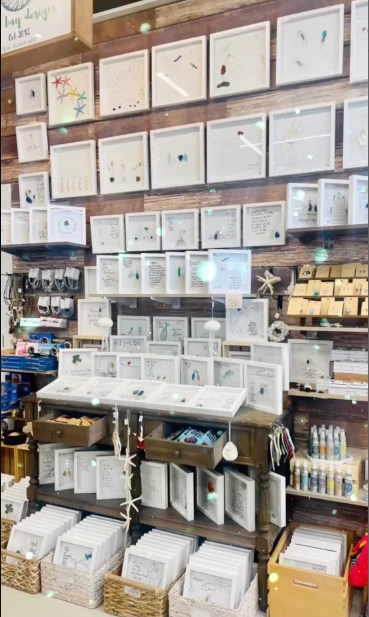 Assorted all sizes with sparkles on brown wall 