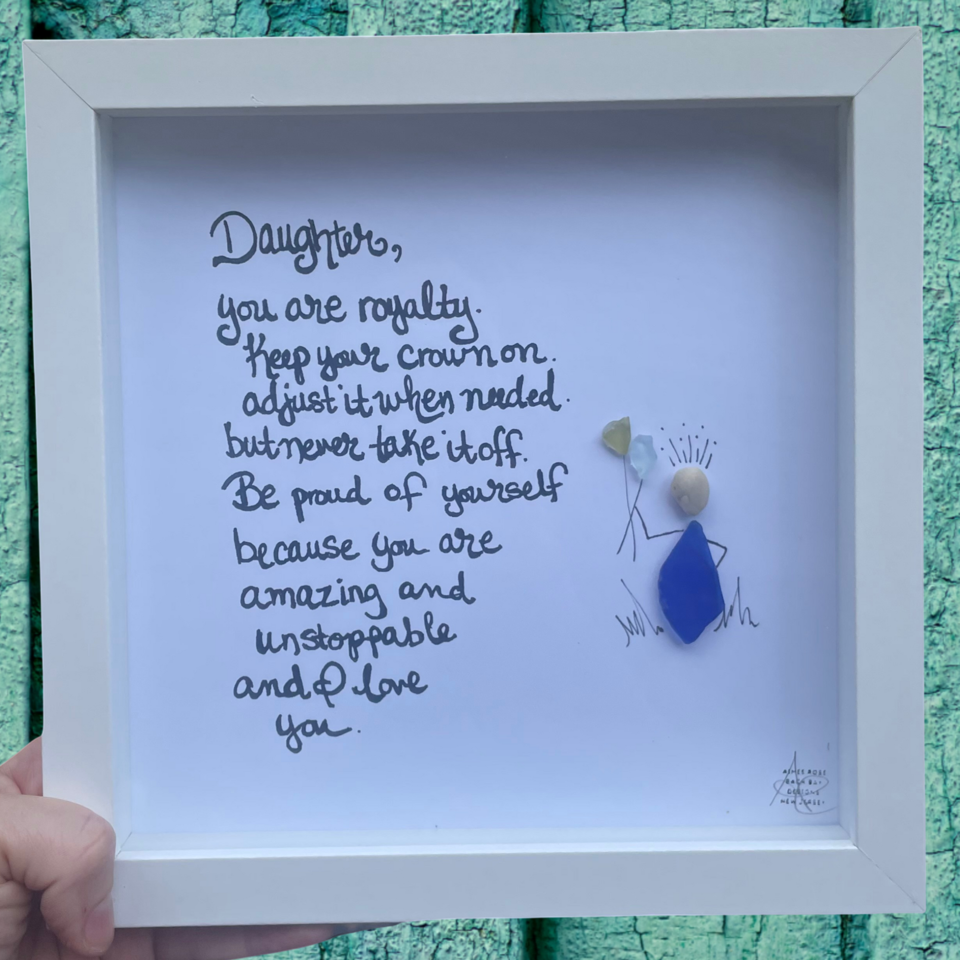 Daughter_Royalty Original_8_inch_Seaglass
person with two flowers and shining crown