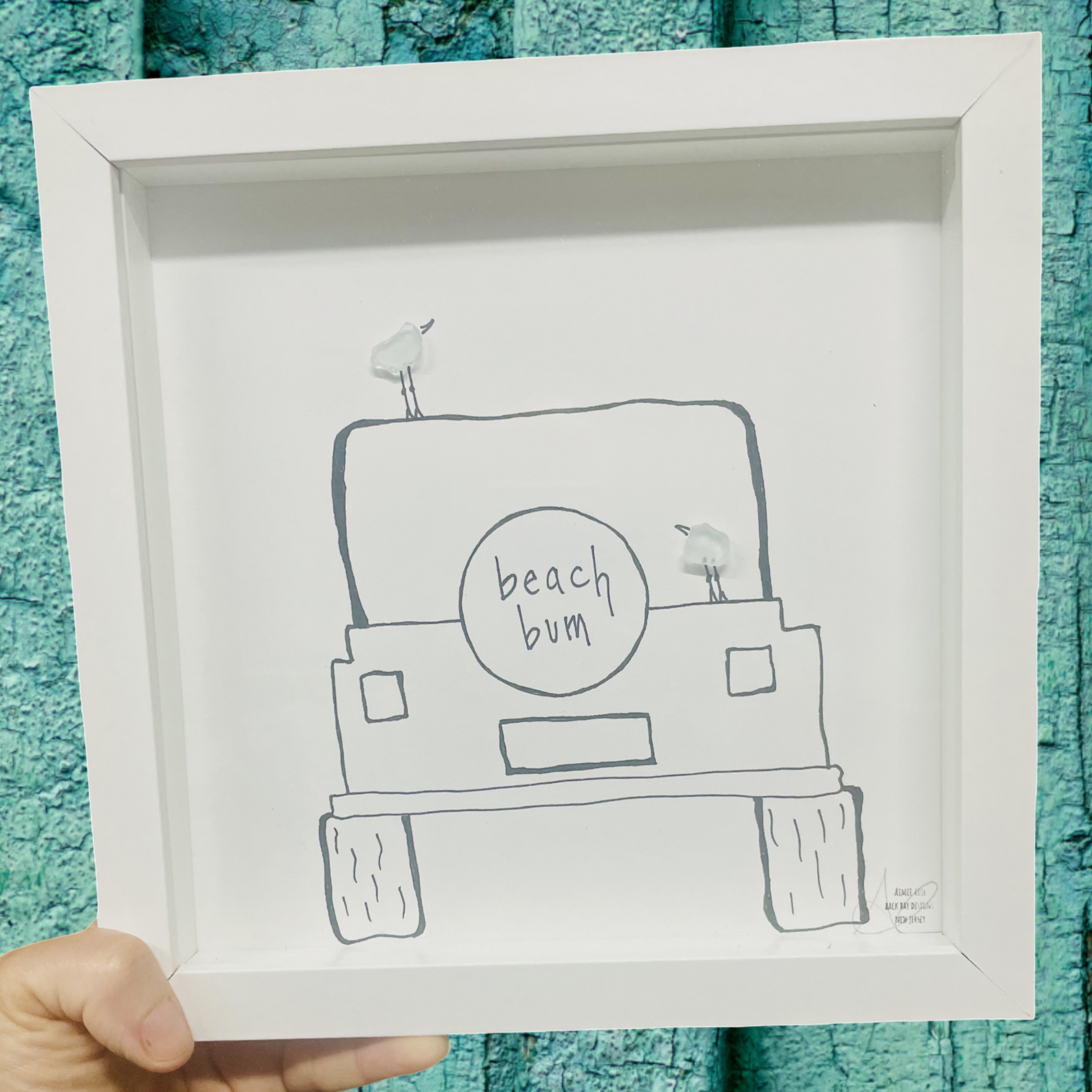 Framed drawing of a beach-themed vehicle with 'beach bum' t sea glass art by aback bay designs