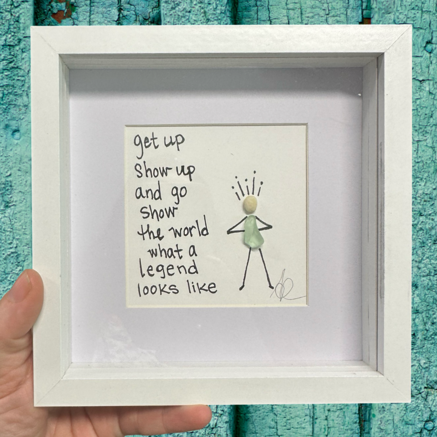 Framed artwork with text and a stick figure drawing get up show up and go show the world what a legend looks like sea glass art 