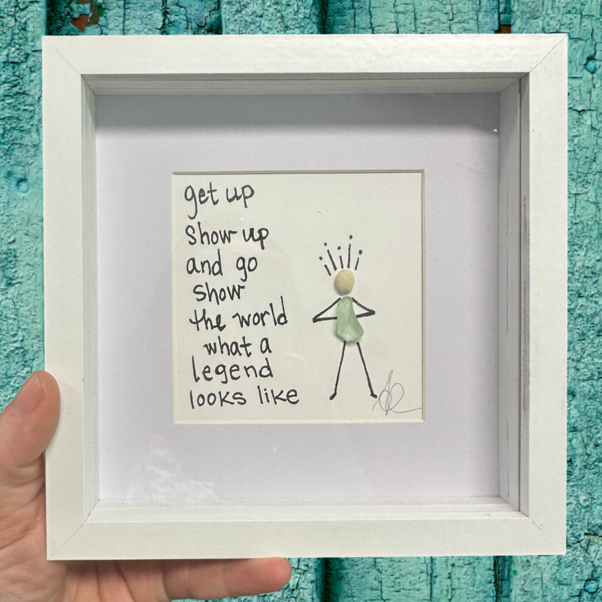 Framed artwork with text and a stick figure drawing get up show up and go show the world what a legend looks like sea glass art 