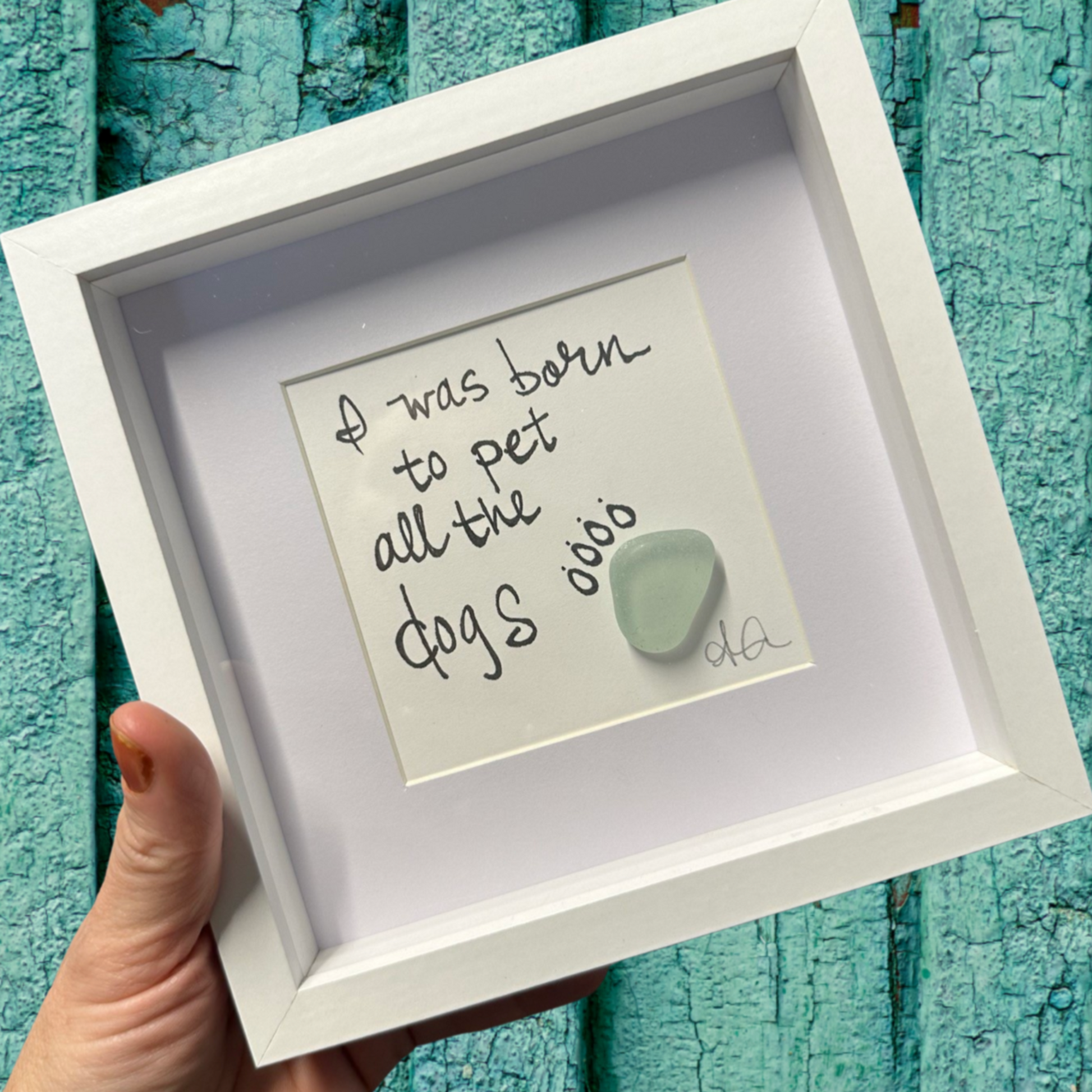 White framed picture with a quote i was born to pet all the dogs sea glass art 