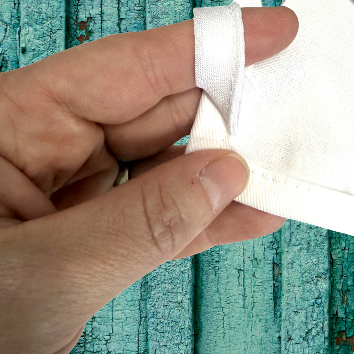 Rear view of cotton loop on tea towel 