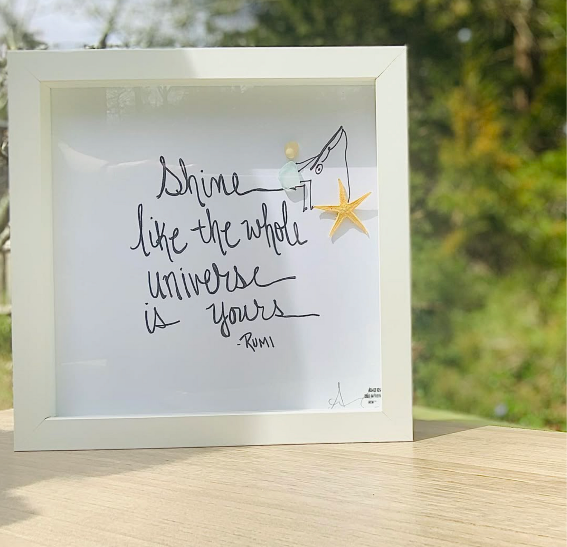 Shine like the Universe Rumi 8x8 sea glass art  outside