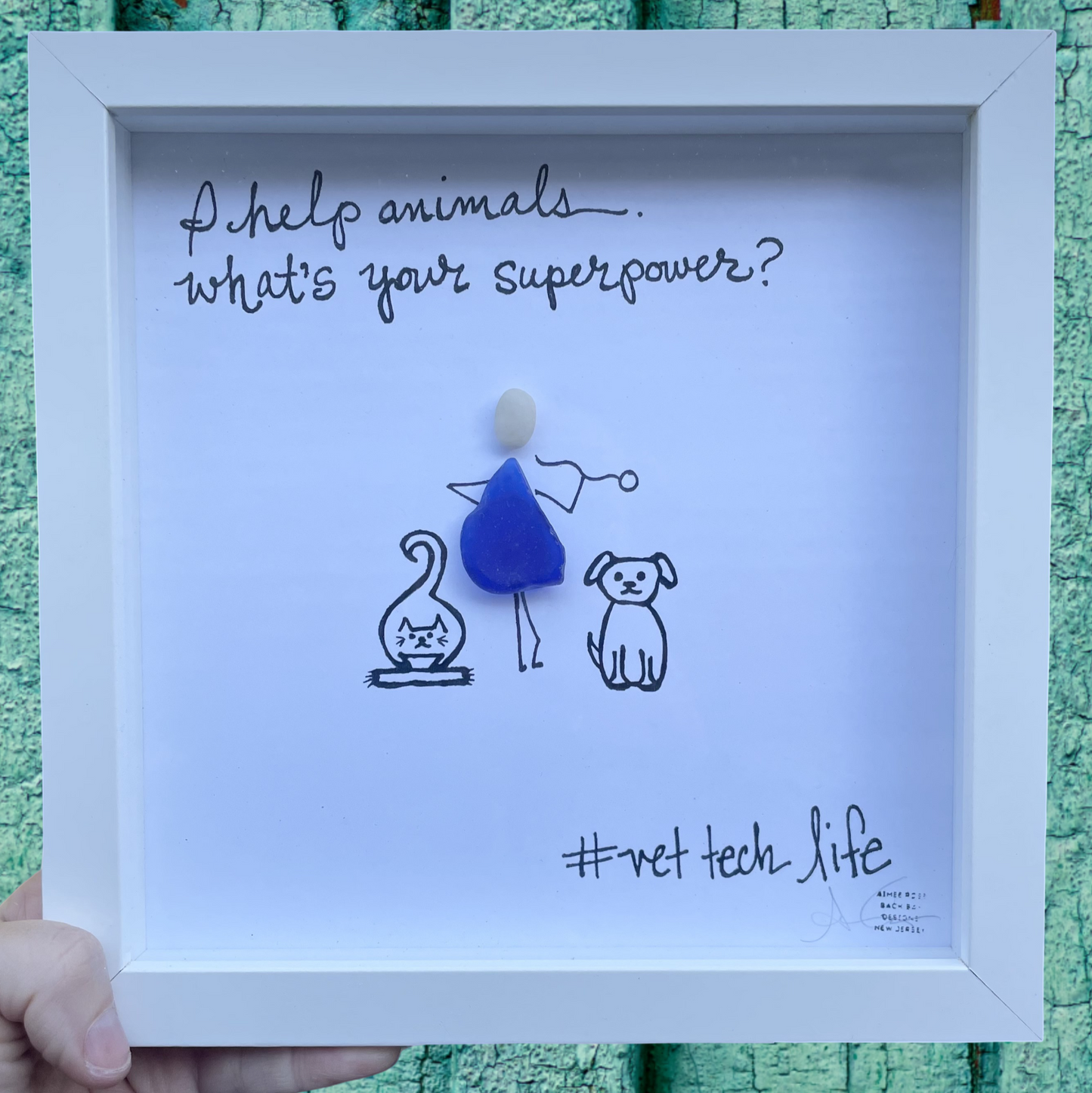 Framed artwork with I help animals what 's your superpower? vet tech life dog cat pet sea glass art 