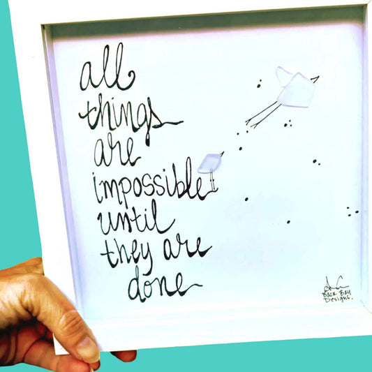 all things impossibleuntiltheyaredonehandheld_brighter_3_TEAL ZOOM