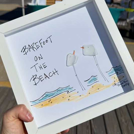 barefoot_on_the_beach_hand_held_on_boardwalk_ square 