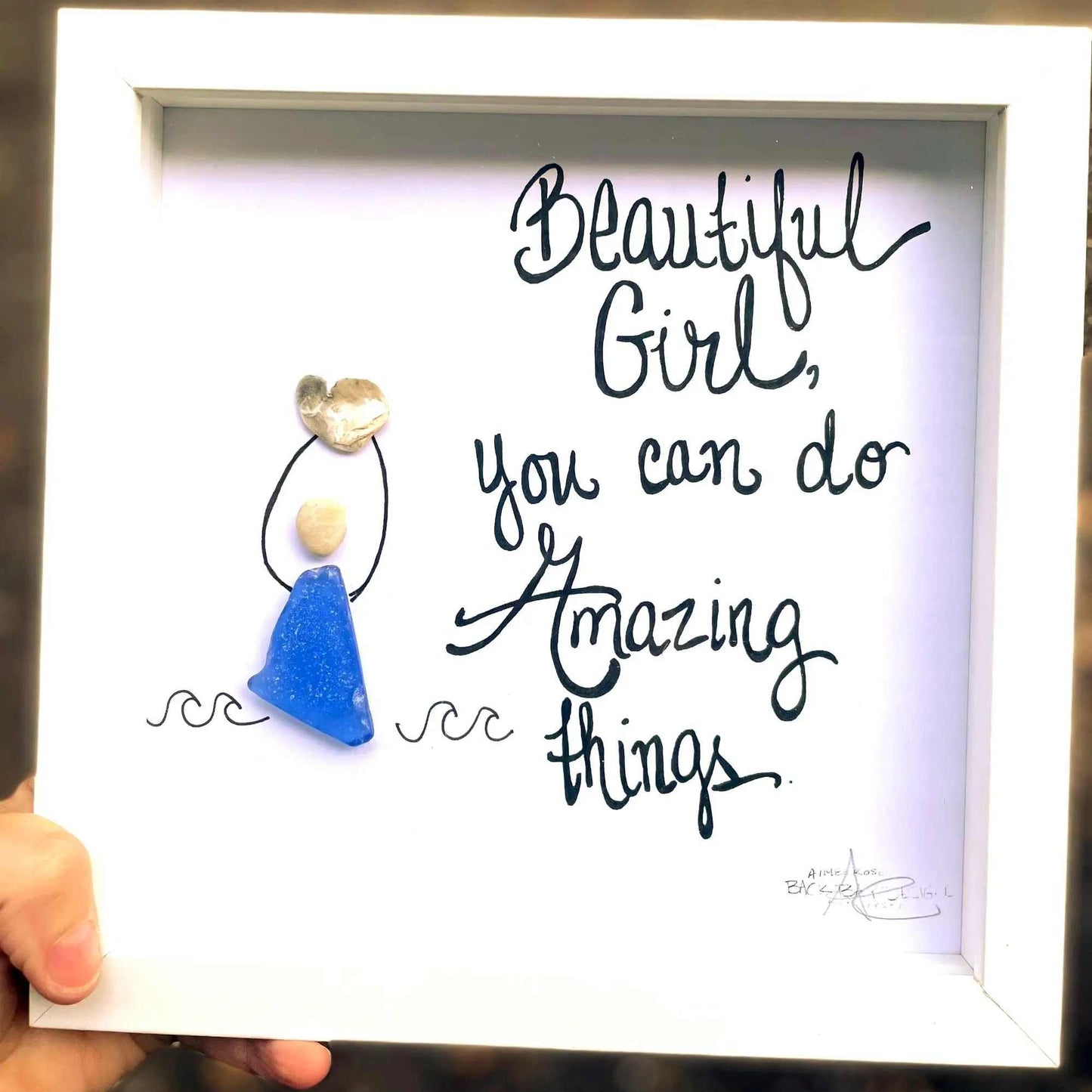 beautifulgirlbluebrighterhandheld square close 