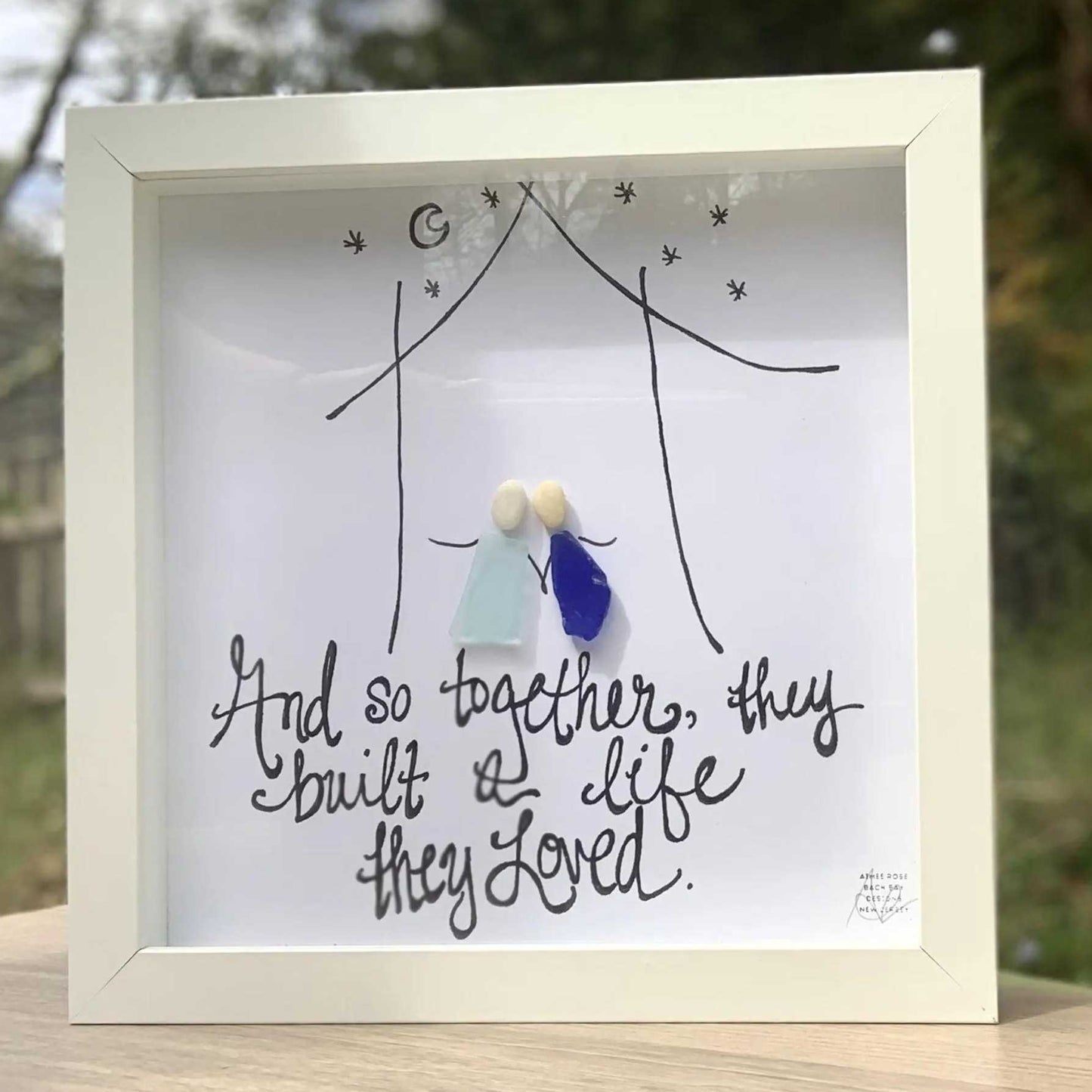 built a life 8x8 sea glass art outside 