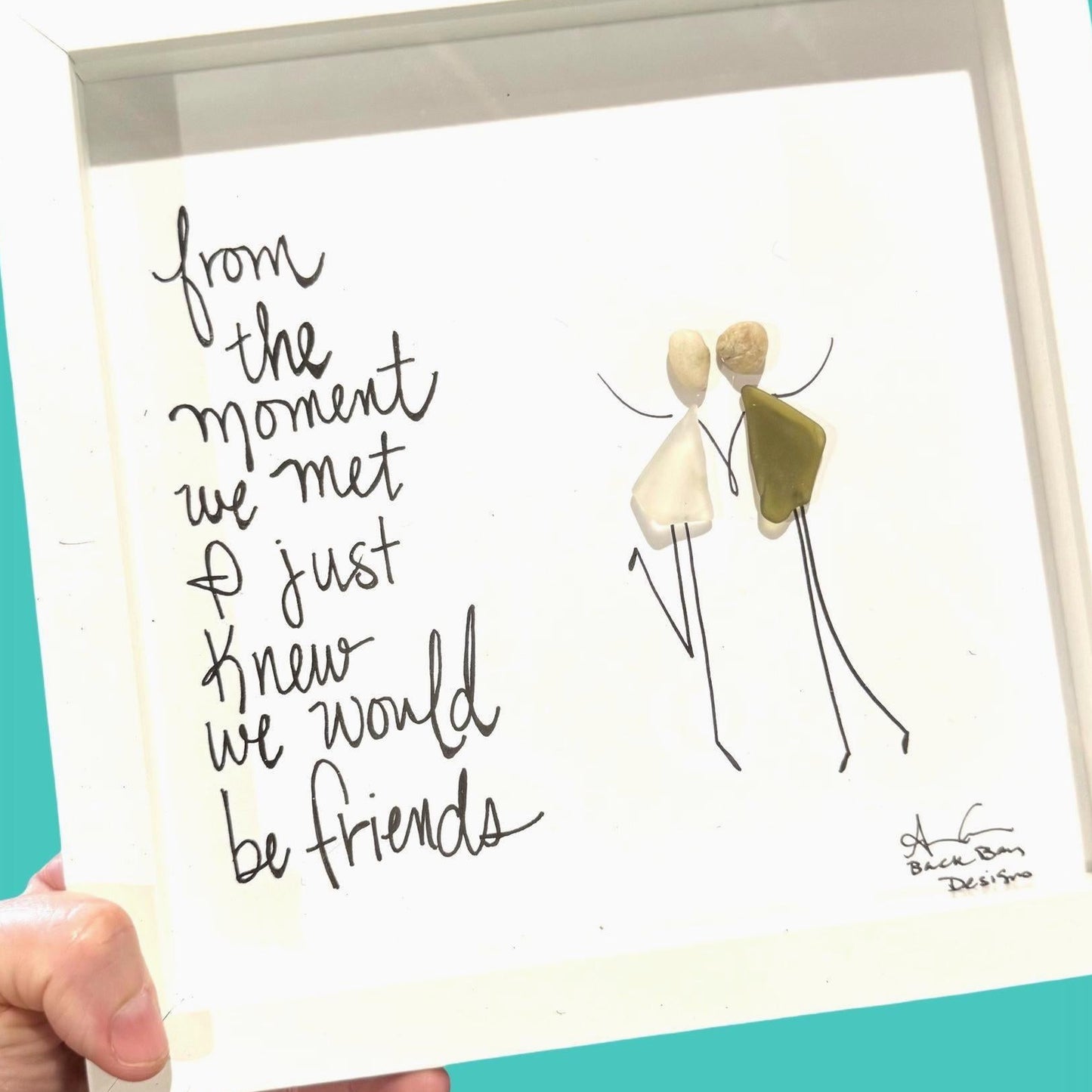 from_the_moment_we_met_friends_brighter_ZOOM "From the moment we met I just knew we would be friends." Two hand drawn sea glass people holding hands, with upstretched arms and kicking up a heel in joy