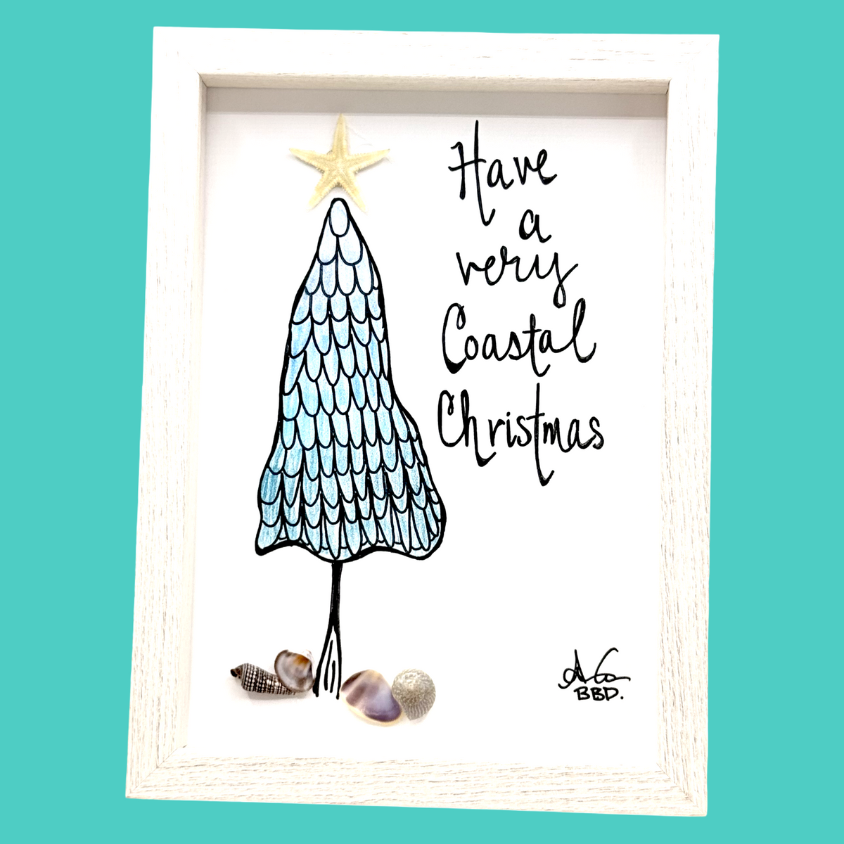 "Have a very coastal Christmas" hand drawn Christmas tree with mermaid scales, real starfish topper, and real sea shell presents under the tree 