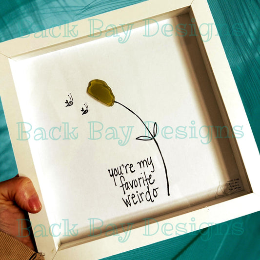 flower with sea glass top, two bees, saying says you’re my favorite weirdo