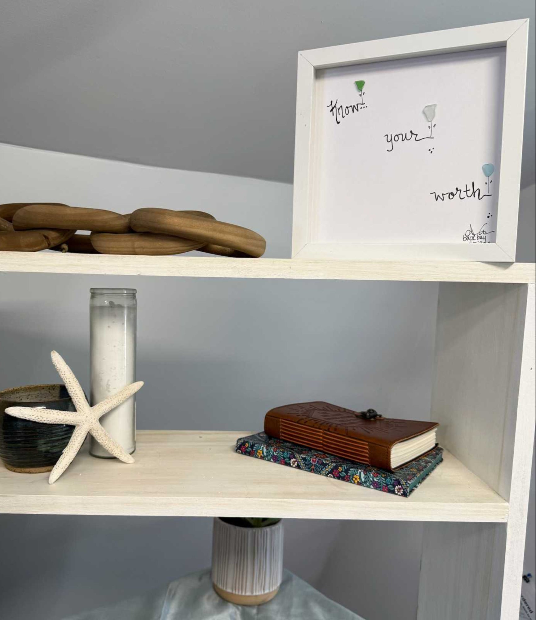 know your worth 8in sea glass at on shelf with candle 