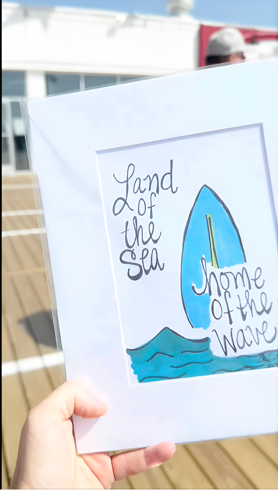 land_of_the_sea_8x10_print_handheld_on_boardwalk_upscale