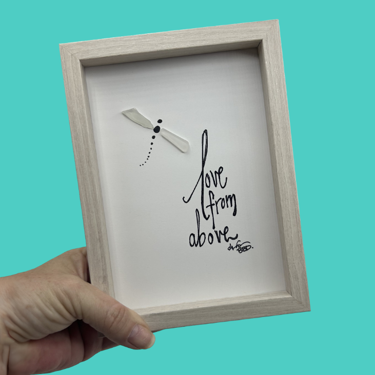 Quote: "love from above" Image: Sea glass dragonfly with a hand-drawn body and dotted trailing tail