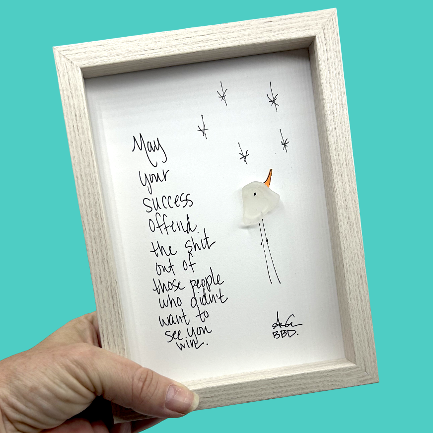 Quote: "May your success offend the s out of those people who didn't want to see you win." Image: Colorful hand-drawn stick-legged bird with a sea glass body gazing up at hand-drawn stars twinkling