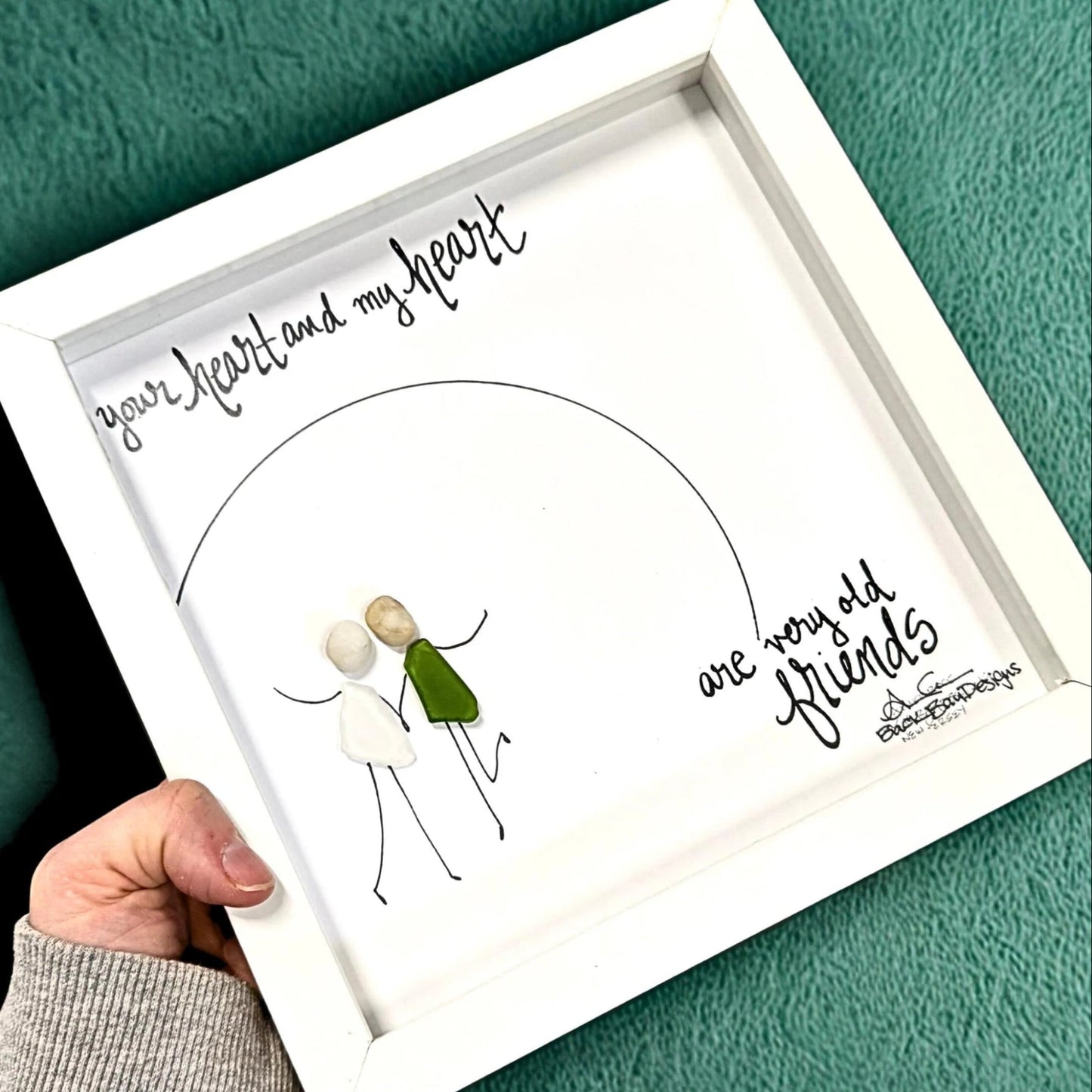 olf friends in arch 8in sea glass art on green leather 