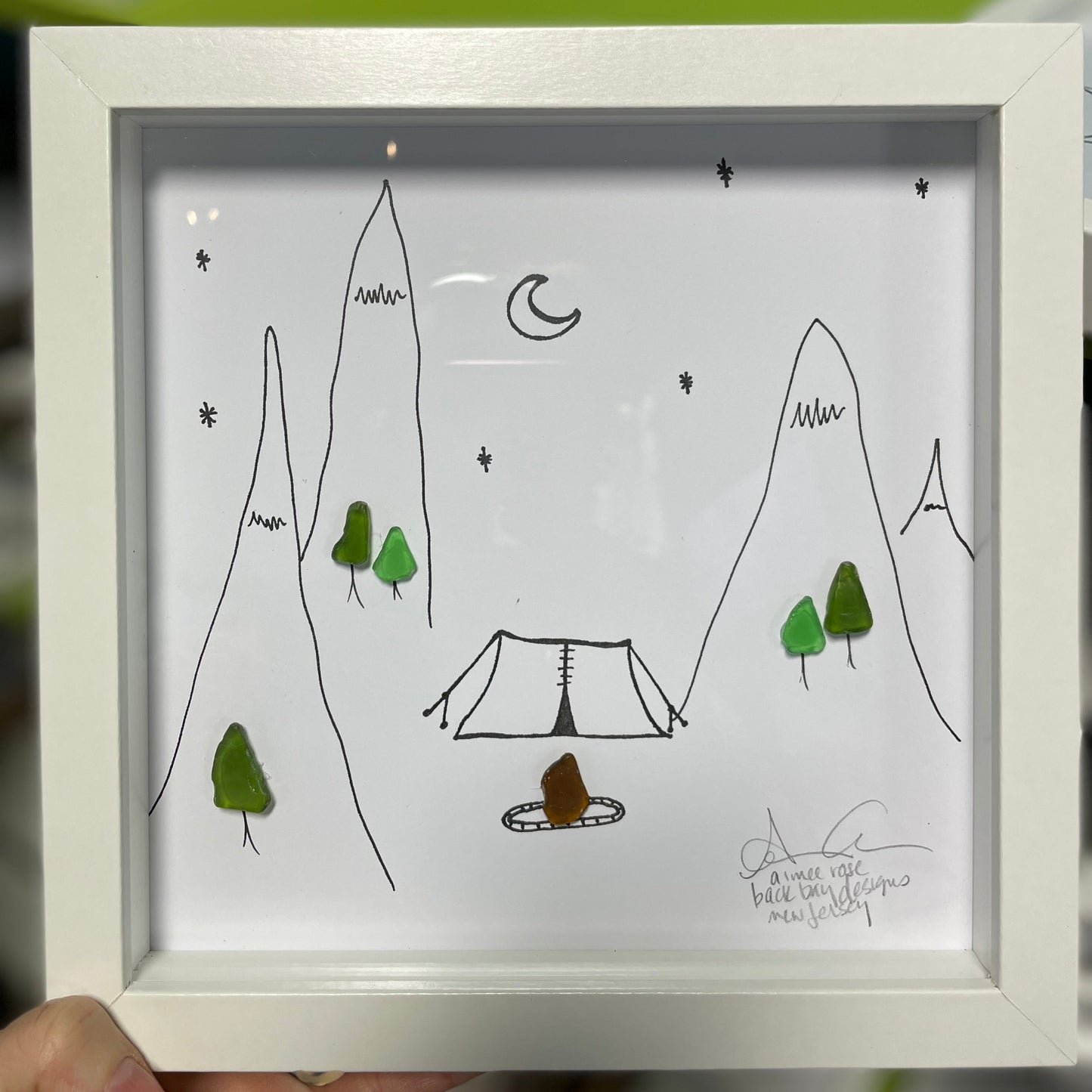tent camp mountains trees sea glass art 